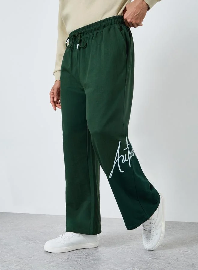 Styli Men Green Embroidered Joggers